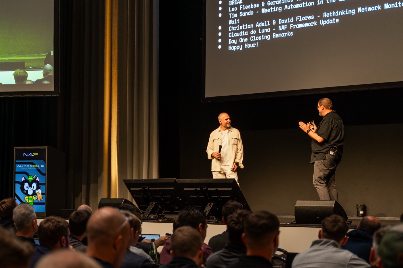 AutoCon speakers in conversation on stage
